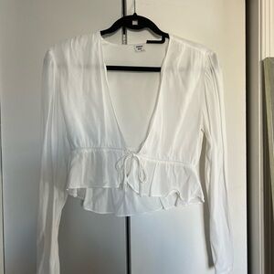 Aritxia V-Neck Blouse with Ruffle Hem